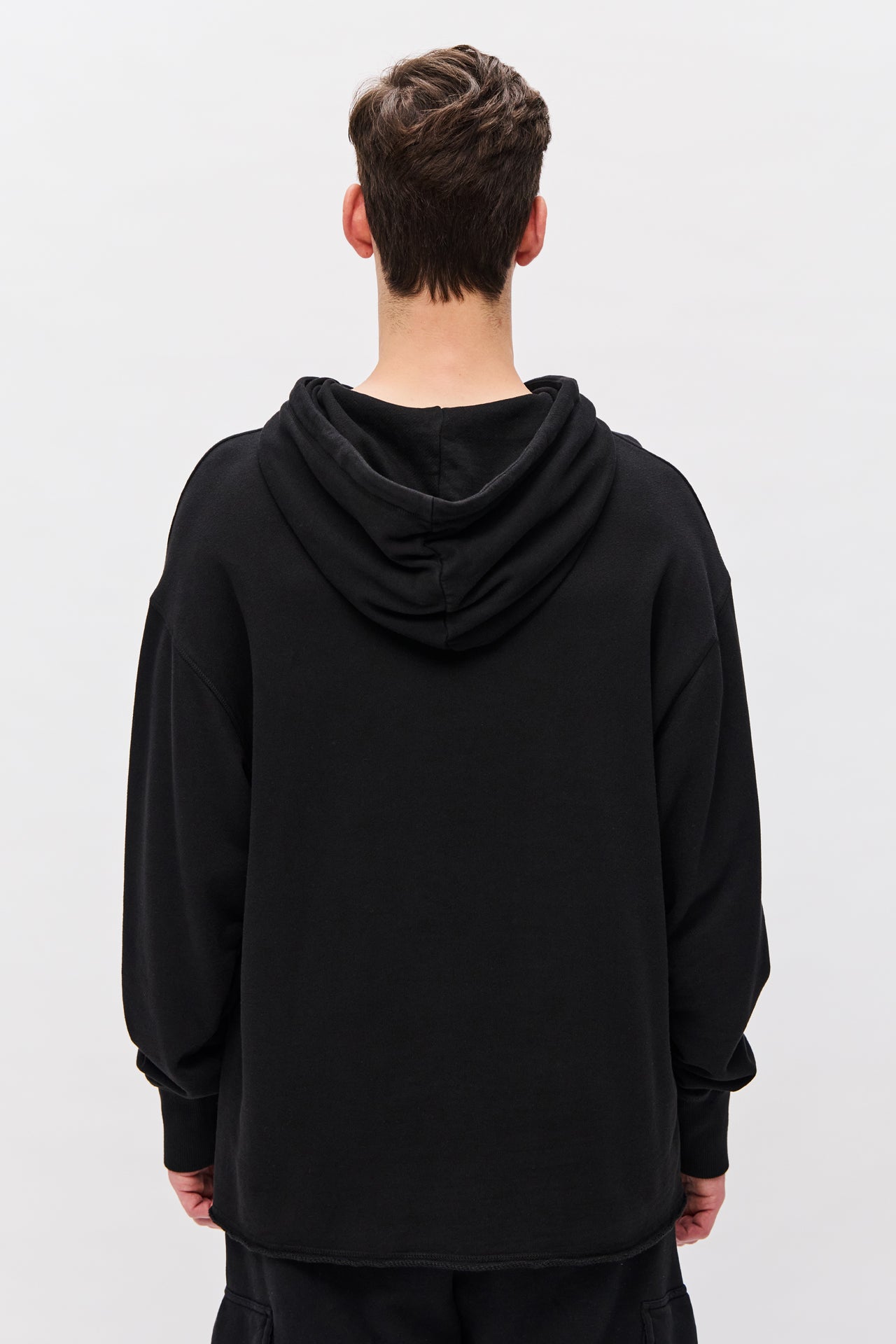 RELAXED HOODIE WITH RAW EDGE HEM-BLACK